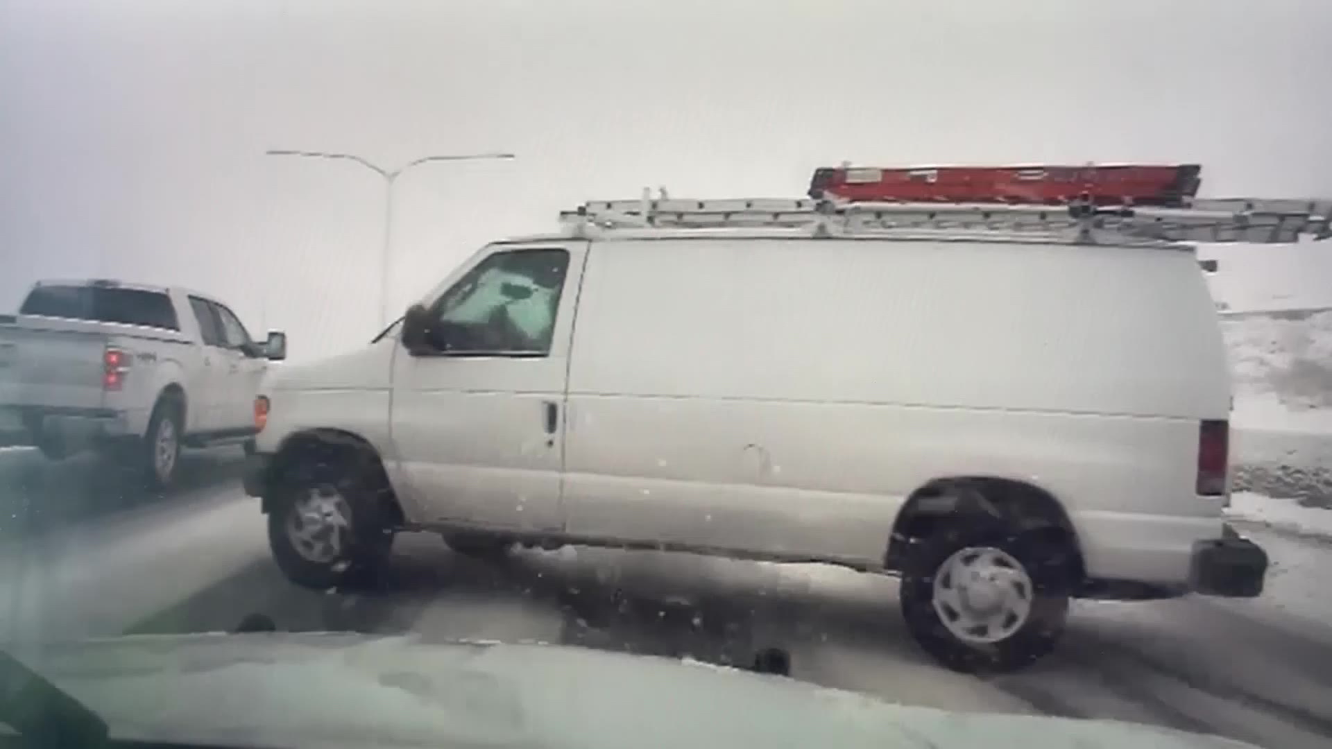 The van losing control on the highway almost hitting UHP Trooper Juan Branchini. (Courtesy: Utah Hi...