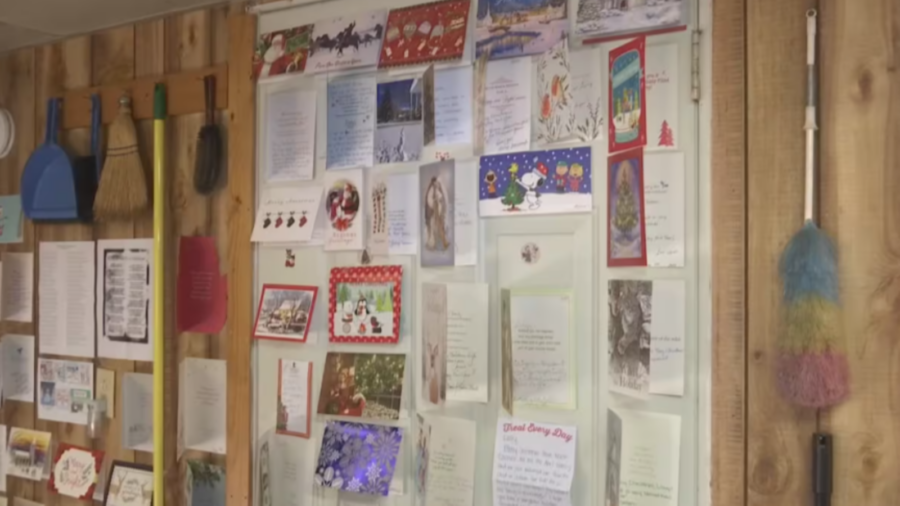 Christmas cards from people all over the United States are pictured in 93-year-old Larry Pratt's ho...