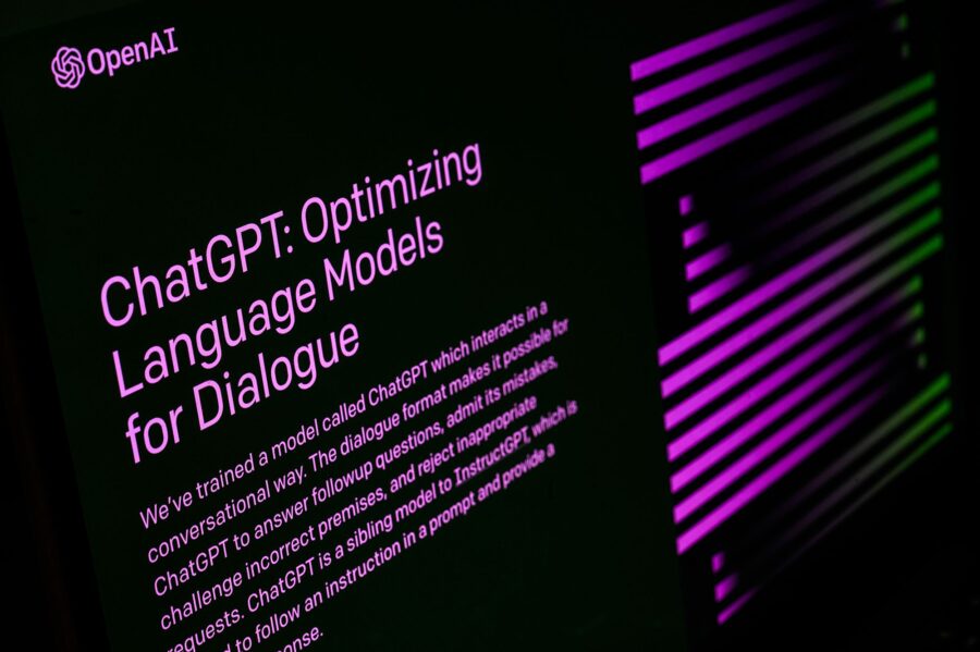 In this photo illustration, the welcome screen for the OpenAI "ChatGPT" app is displayed on a lapto...