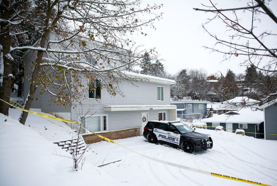 Police tape surrounds the off-campus home where four University of Idaho students were killed in 20...