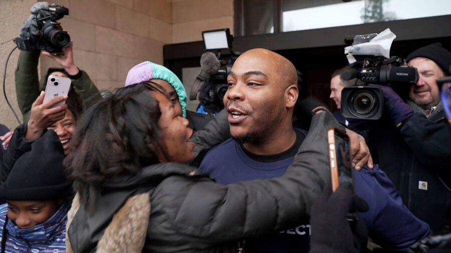 Marvin Haynes, 35, is hugged by a supporter as he walks out of the Minnesota Correctional Facility ...
