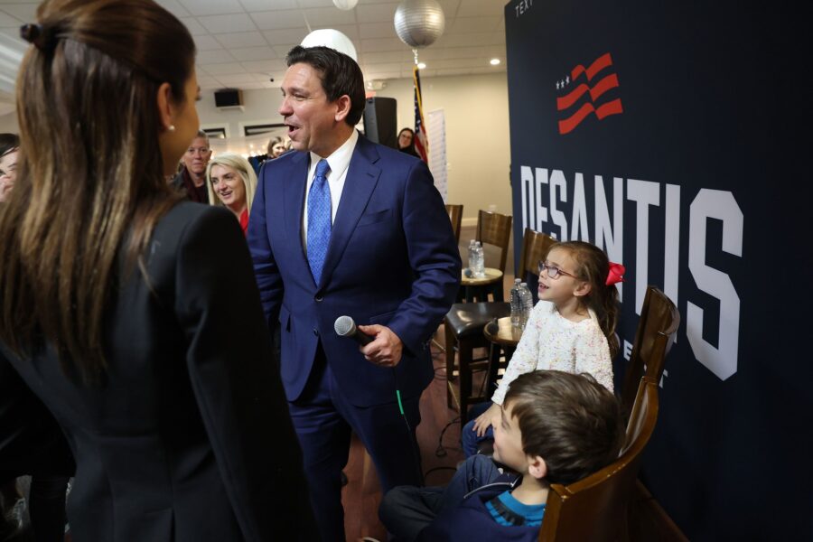 Florida Gov. Ron DeSantis and his family greet guests after speaking at an event in Bettendorf, Iow...