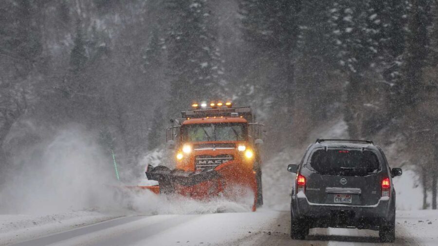 A snowplow clears the road in Big Cottonwood Canyon on Dec. 1. A third storm is expected to impact ...