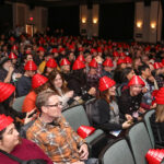 An audience gathers to watch the documentary based on "DEVO" playing at the 2024 Sundance Film Festival. (Sundance Institute)