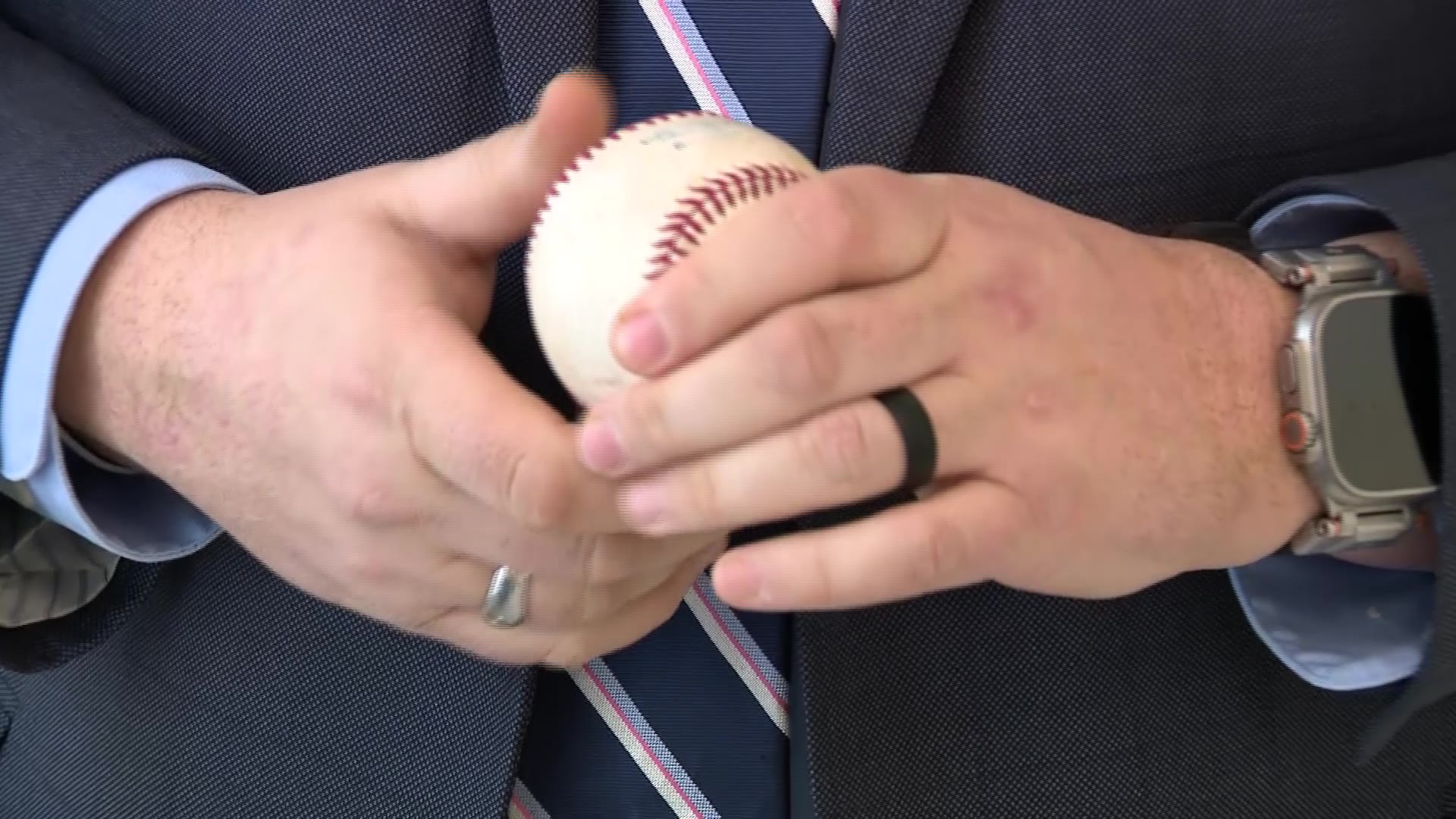 Rep. Ryan Wilcox holding a baseball at the State Capitol....