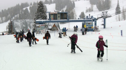 Skiers and snowboarders at the Beaver Mountain Resort