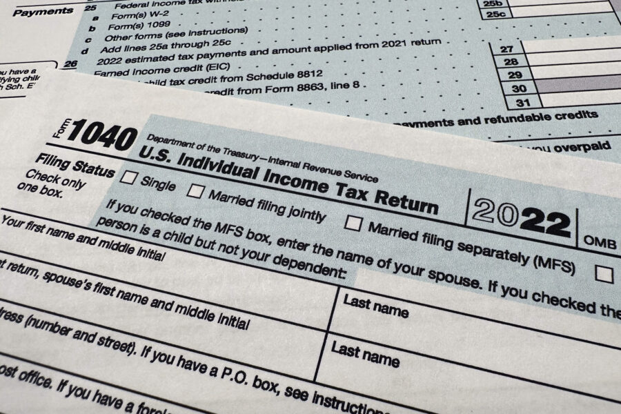 FILE - The Internal Revenue Service 1040 tax form for 2022 is seen on April 17, 2023. Majorities of...