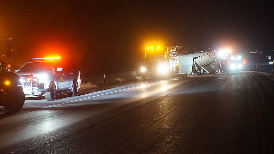 Two people died and one was injured when a car hit an overturned semitruck on northbound I-15 in Pa...