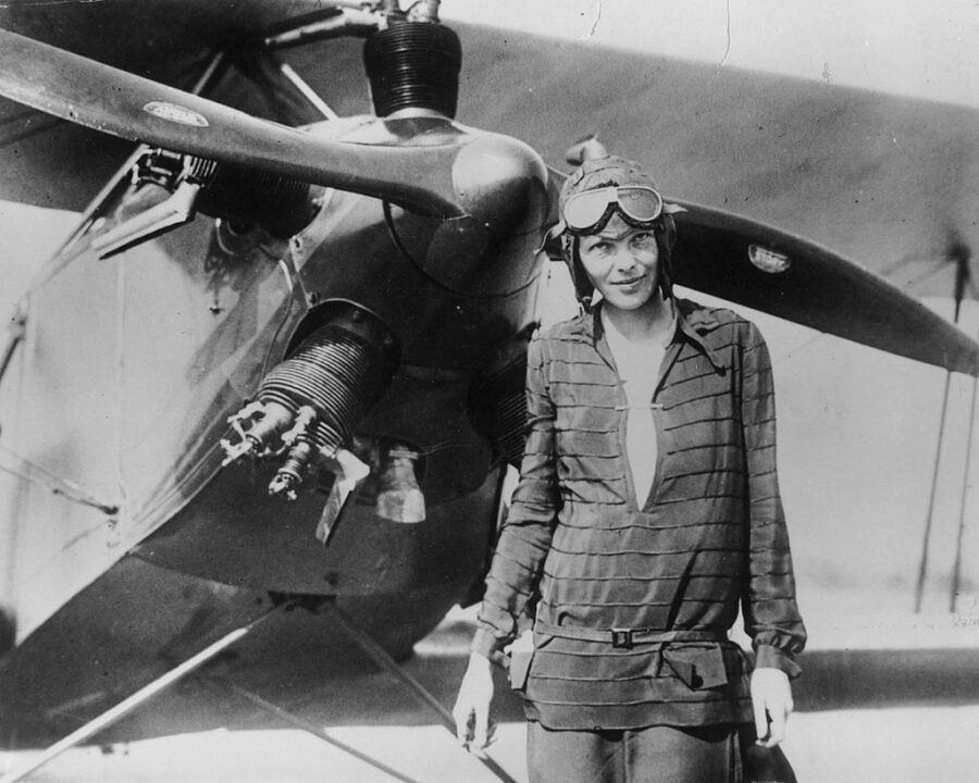 394033 03: (FILE PHOTO) Amelia Earhart stands June 14, 1928 in front of her bi-plane called "Friend...