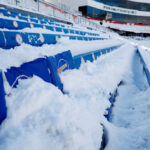 ORCHARD PARK, NEW YORK - JANUARY 15: Detail of a snow-covered seat before the AFC Wild Card playoff game between the Buffalo Bills and Pittsburgh Steelers at Highmark Stadium on January 15, 2024 in Buffalo, New York. The Bills hired local residents to help clear snow from the stadium before today's game. A blizzard caused the game to be postponed from Sunday. (Photo by Sarah Stier/Getty Images)