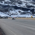 A Utah Highway Patrol Trooper stops traffic on Interstate 80.  (Utah DWR) 
