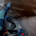 A rescue crew member being dropped into the Sandthrax Canyon by helicopter and finding the two climbers. (Utah Department of Public Safety)