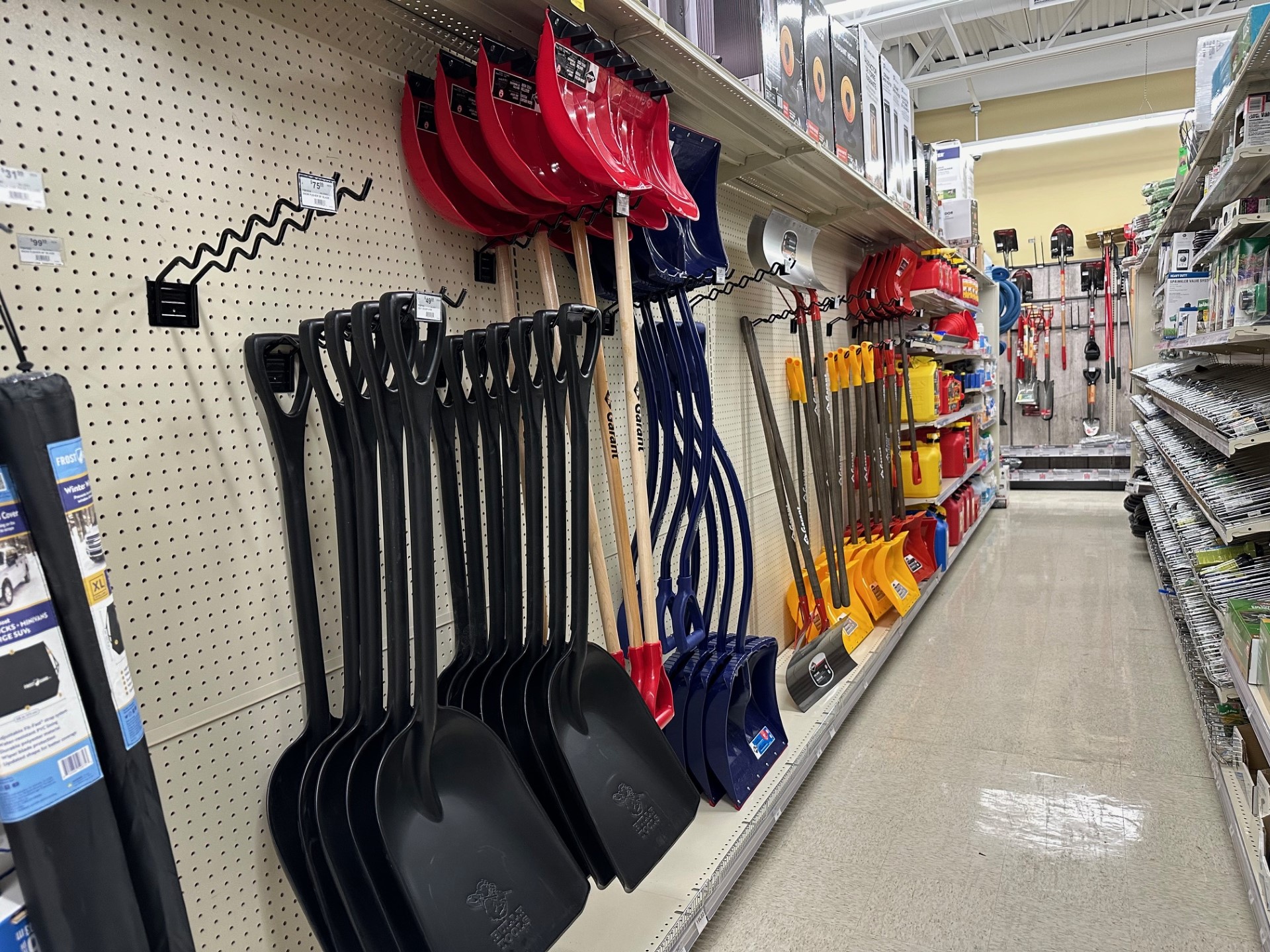 An aisle of snow shovels at Ace Hardware in Cottonwood Heights....