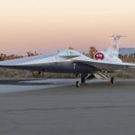 NASA's X-59 quiet supersonic research aircraft sits on the ramp at Lockheed Martin Skunk Works in Palmdale, California during sunrise. (Steve Freeman, NASA) 