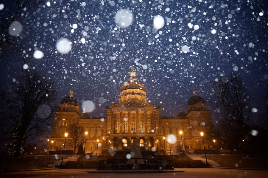 Snow falls on the Iowa State Capitol in Des Moines amid a powerful winter storm on January 8. (Chip...