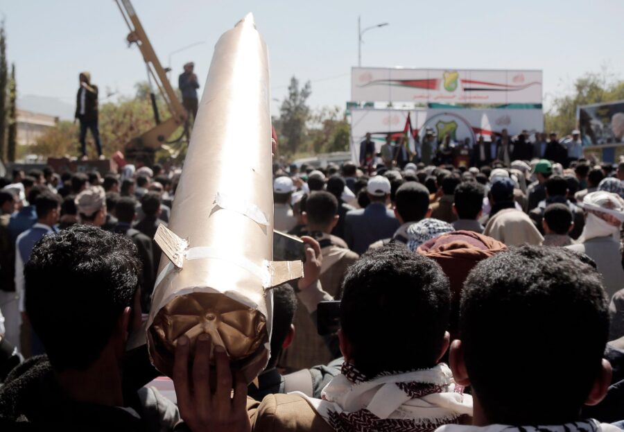 Yemenis lift a mock missile at a protest against the US-led airstrikes on Yemen. (Mohammed Hamoud/G...