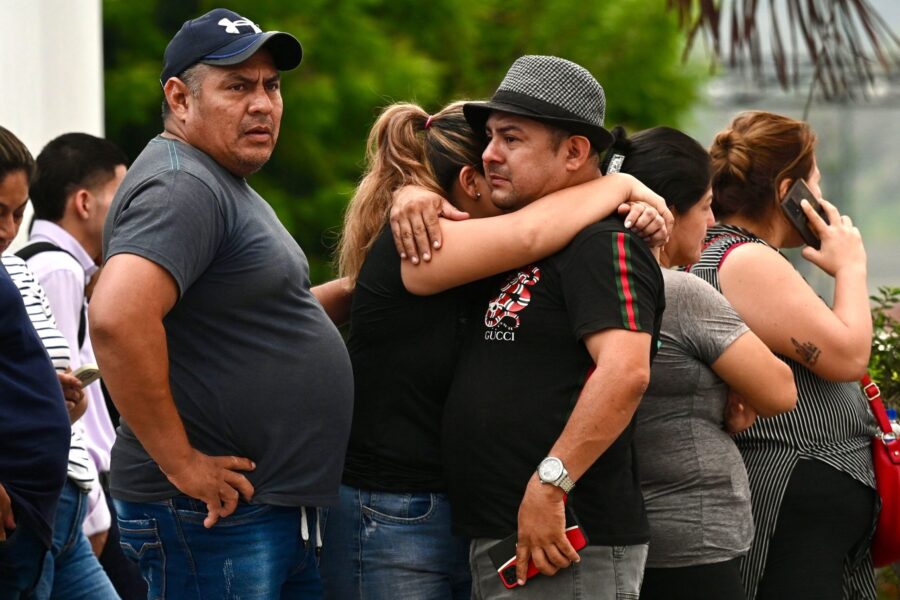 Relatives of slain prosecutor Cesar Suarez outside the morgue in Guayaquil, Ecuador on January 17.
...
