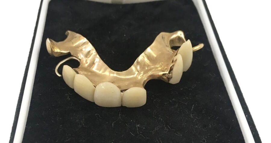 Winston Churchill always wore a set of false teeth.
Mandatory Credit:	The Cotswold Auction Company...