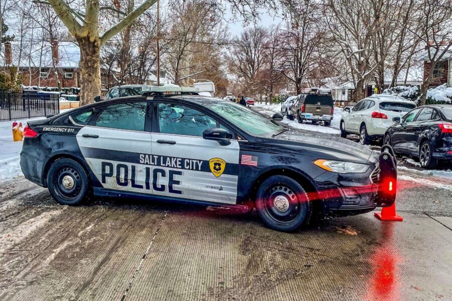 A Salt Lake City Police patrol car blocks the road as officers investigate a burglary near 1400 Sou...