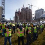 Construction team members gather Tuesday, February 13, 2024, to sign some of the final reinforcing steel that will go atop the Salt Lake Temple.
 2024 by Intellectual Reserve, Inc. All rights reserved.