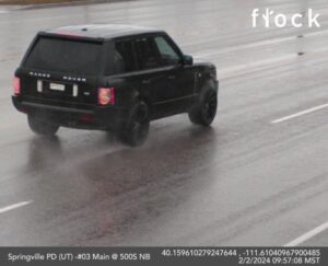 Security Camera picture of the Suspect's vehicle, a black Range Rover. 