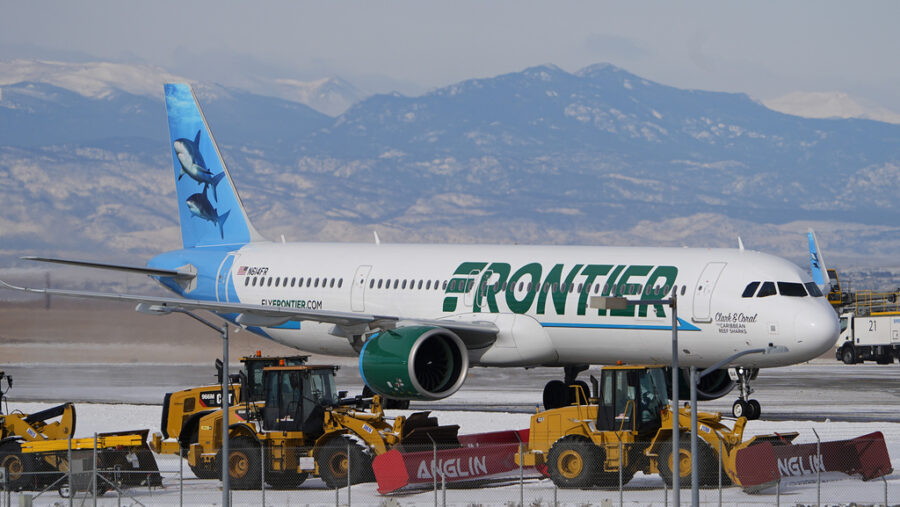 A Frontier Airlines jetliner arrives at Denver International Airport after a winter storm swept thr...