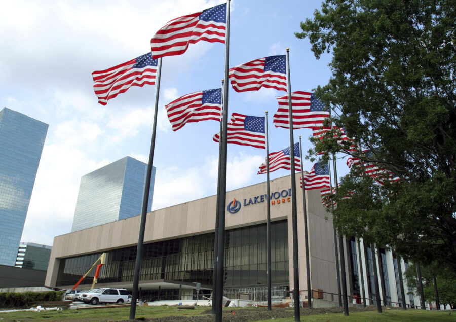 FILE - Flags fly in front of the Lakewood Church in Houston, June 28, 2005. Police in Texas said Su...