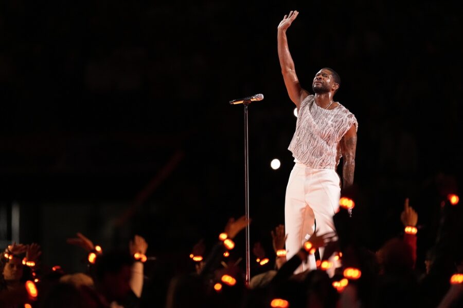 Usher performs during halftime of the NFL Super Bowl 58 football game between the San Francisco 49e...