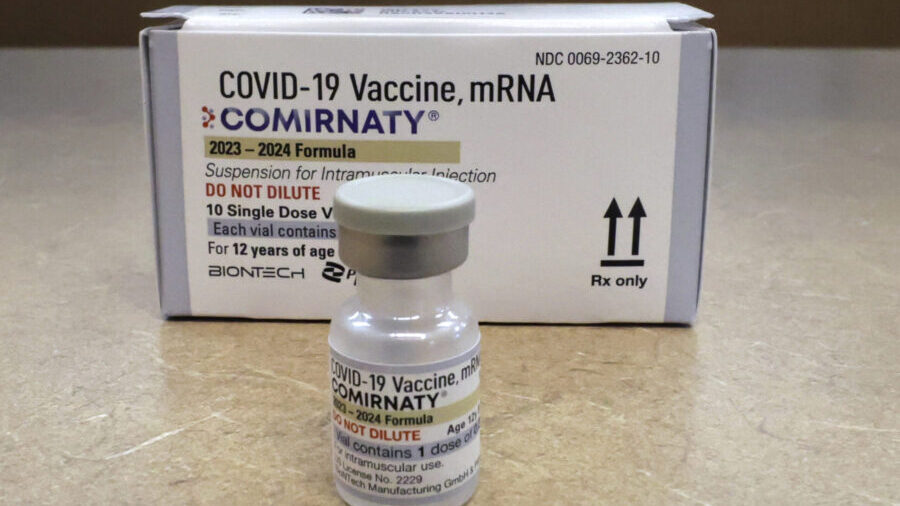 FILE - Comirnaty, a new Pfizer/BioNTech vaccination booster for COVID-19, is displayed at a pharmac...