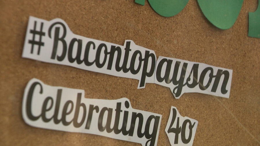 #BacontoPayson displayed on a cork board in Payson High School...