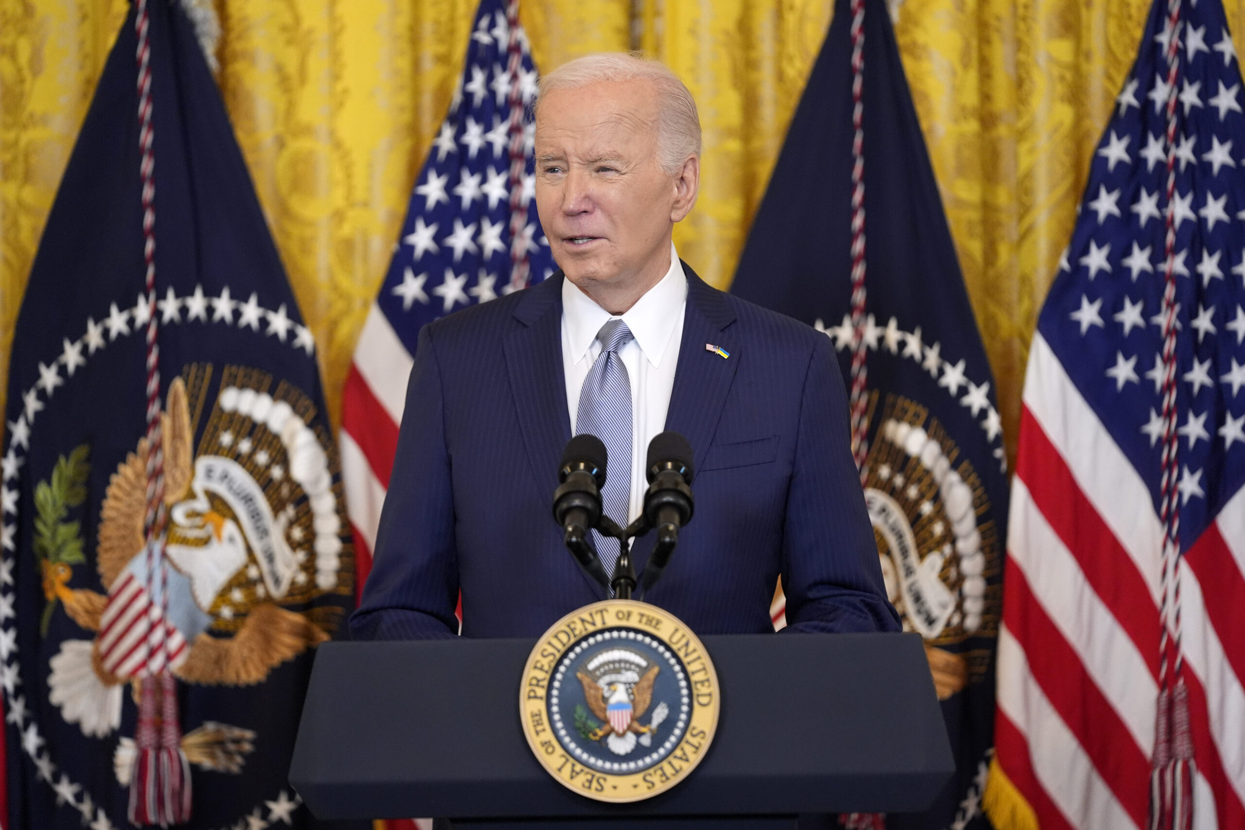 FILE - President Joe Biden speaks in the East Room of the White House, Feb. 23, 2024, in Washington...
