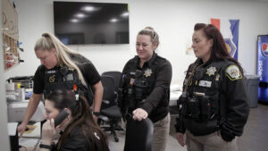 corrections officers in a room