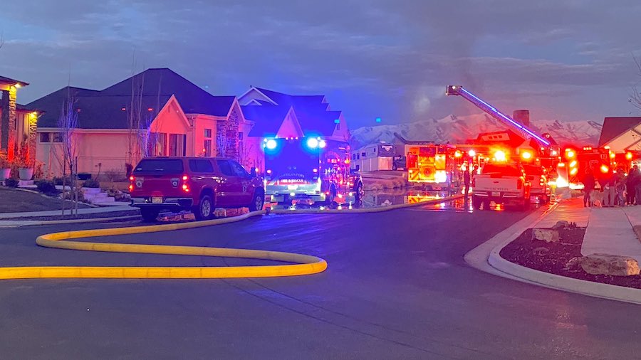 Emergency crews at the scene of a house fire in Lehi. (Derek Petersen, KSL TV)...