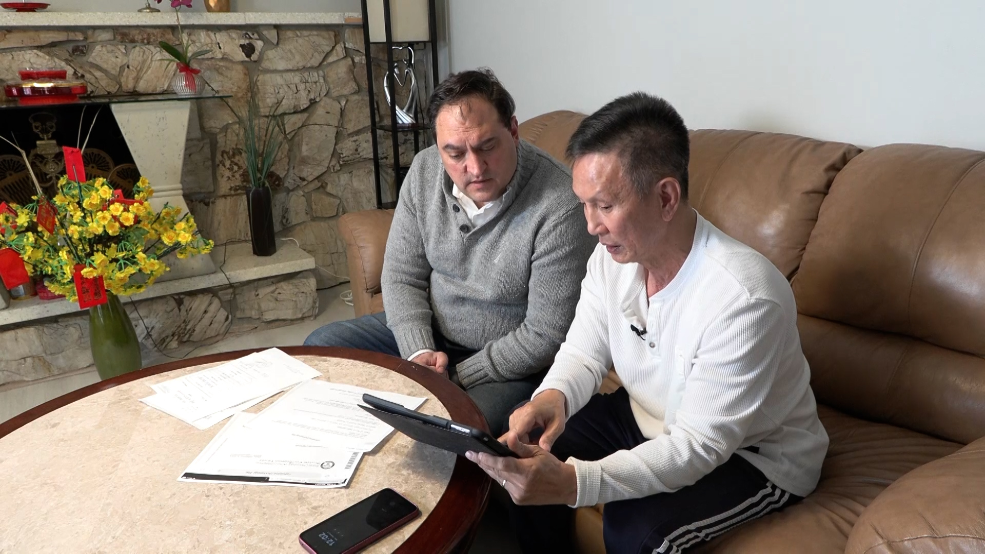Matt Gephardt with Hung Tran who is explaining why he has been trying to get his social security be...