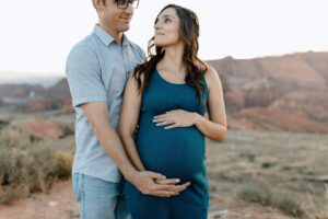 Jayde St. Clair (right) pregnant, with her husband (left).