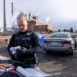 A Salt Lake City police officer processes evidence after a foot pursuit during a drug operation. (Salt Lake City Police Department)