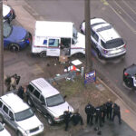 A man in a United States Postal Service truck was detained by police on Monday, Feb. 5, 2024. (Chopper 5, KSL TV)