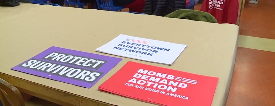 Grieving moms with Moms Demand Action, came together at the American Visionary Arts Museum to make ...