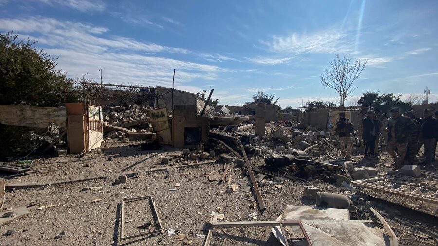 A destroyed building is pictured at the site of a U.S. airstrike in al-Qaim, Iraq, Saturday, Feb. 3...