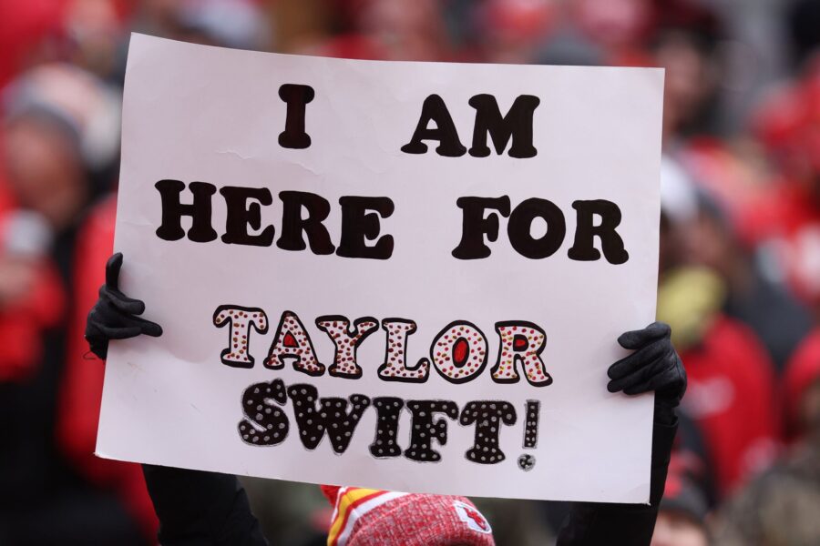 Fans display signs in support of Taylor Swift during a Raiders-Chiefs football game in Kansas City ...
