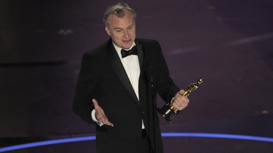 Christopher Nolan accepts the award for best director for "Oppenheimer" during the Oscars on Sunday...