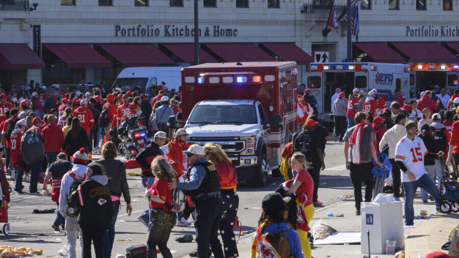 FILE - Police clear the area following a shooting at the Kansas City Chiefs NFL football Super Bowl...