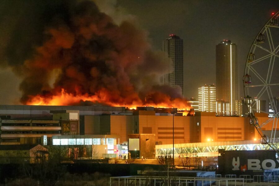 A massive blaze is seen over the Crocus City Hall on the western edge of Moscow, Russia, Friday, Ma...