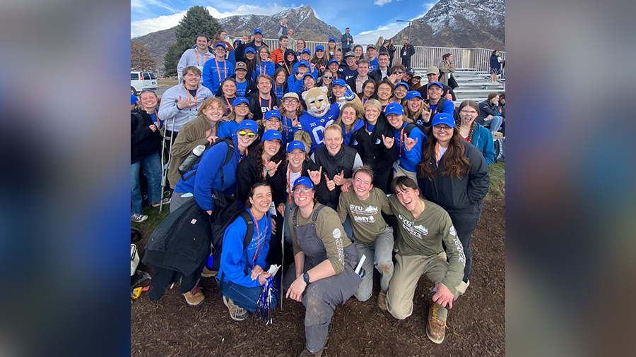 The Brigham Young University national landscaping team posing in front of the grounds....
