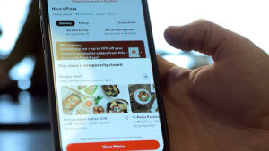 A phone displaying a message for a bogus restaurant listing
