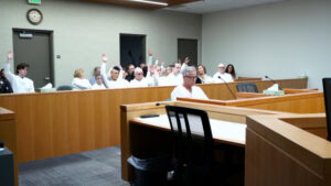 More than two dozen people packed a parole board hearing room on March 5, 2024, to support survivors asking Utah's parole board to keep Byron Thad Haderlie incarcerated. (Josh Szymanik, KSL-TV)