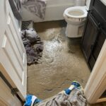 The sewage flood did an estimated $55,000 in damages. (Mike Anderson, KSL TV)