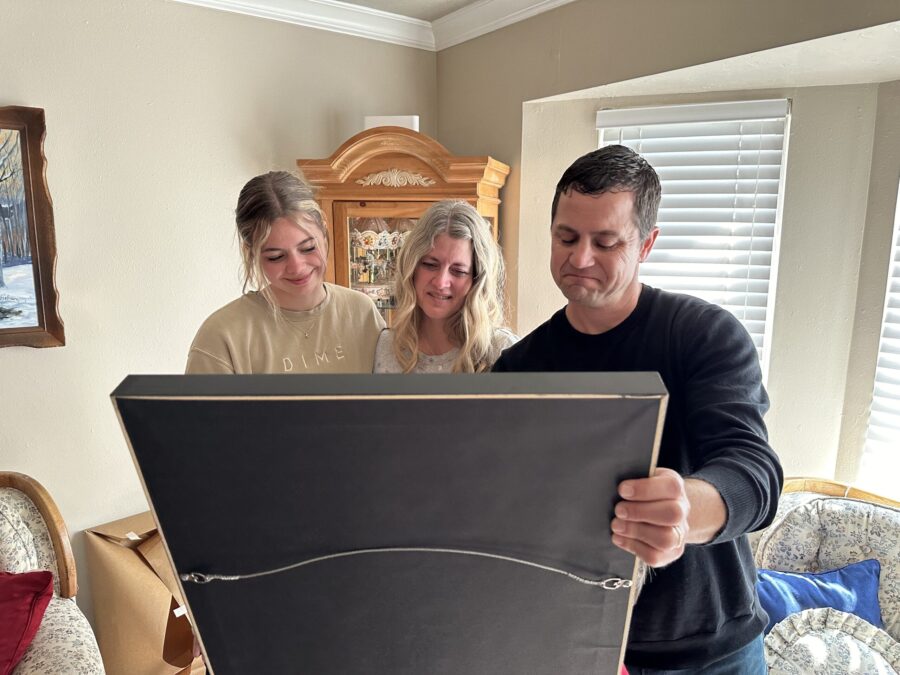 Beagley family opens a portrait of their daughter who died in a tubing accident. (KSL TV)...