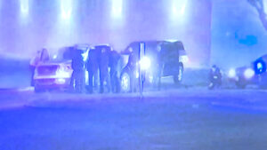 Video of police officers on the scene at the parking lot. 