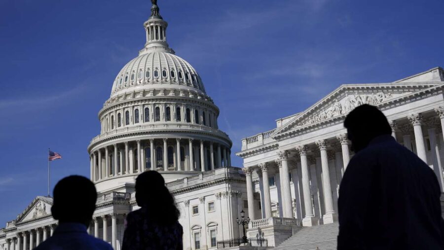 People walk outside the U.S. Capitol in Washington, D.C., on June 9, 2022. Utah has a "heavy depend...